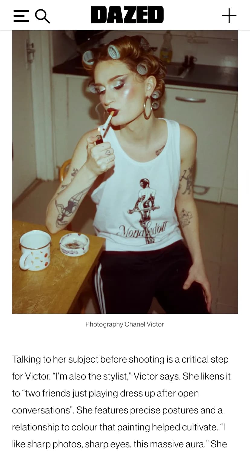 Chanel Victor photography on DAZED - Performer with hair rollers lighting a cigarette in kitchen